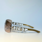 Side view of vintage Christian Dior Diorlywood sunglasses with star-accented frame