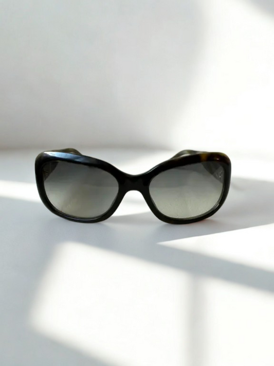 Front view of Chanel sunglasses with ombré gradient lenses